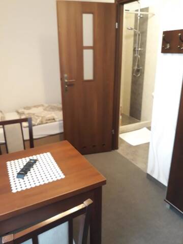 Фото номера Одноместный номер с ванной комнатой Апартаменты Astra Apartments г. Освенцим 2