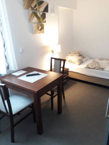 Фото номера Одноместный номер с ванной комнатой Апартаменты Astra Apartments г. Освенцим 4