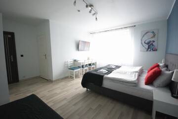 Фото номера Четырехместный номер с ванной комнатой Проживание в семье 7th Room Guest House г. Освенцим 5
