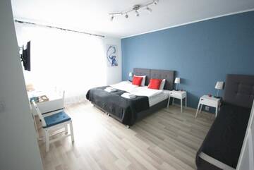 Фото номера Четырехместный номер с ванной комнатой Проживание в семье 7th Room Guest House г. Освенцим 6