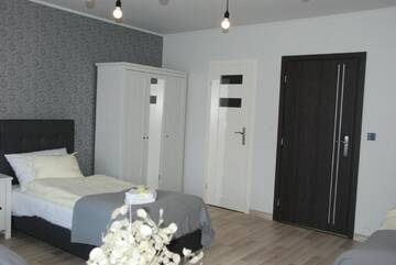 Фото номера Трехместный номер Делюкс Проживание в семье 7th Room Guest House г. Освенцим 4
