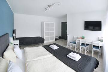Фото номера Стандартный трехместный номер Проживание в семье 7th Room Guest House г. Освенцим 9