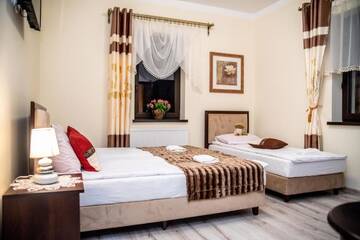 Фото номера Трехместный номер Отель Hotel Artur г. Освенцим 42